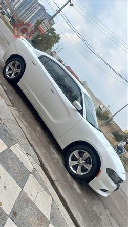 دۆج چارجەر